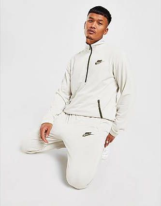 Nike Sportswear Sport Essentials Trainingspak van poly knit materiaal voor heren Light Bone/Rough Green Heren